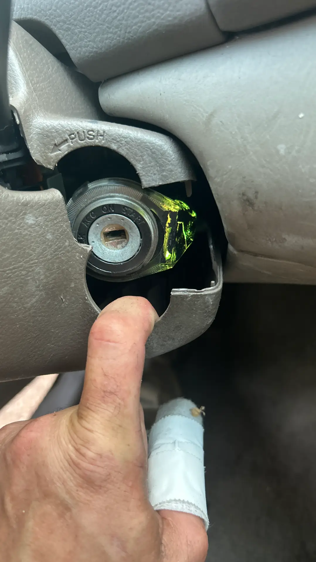 Car key inserted in a vehicle ignition
